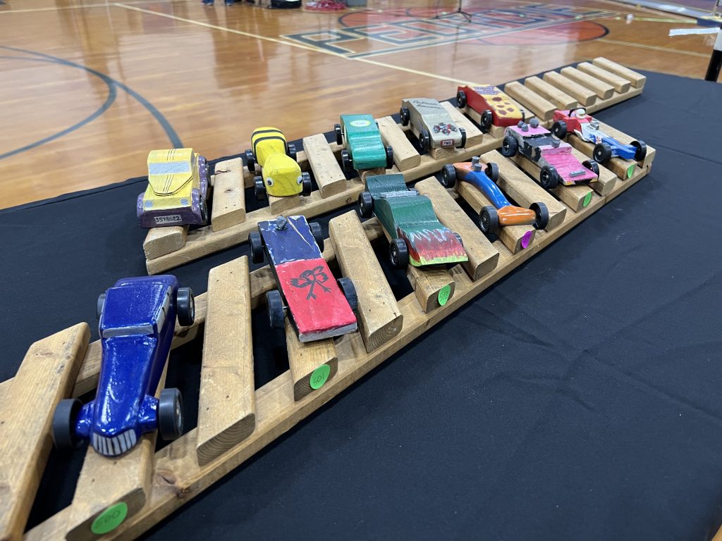 The 2022 Pinewood Derby Cars.