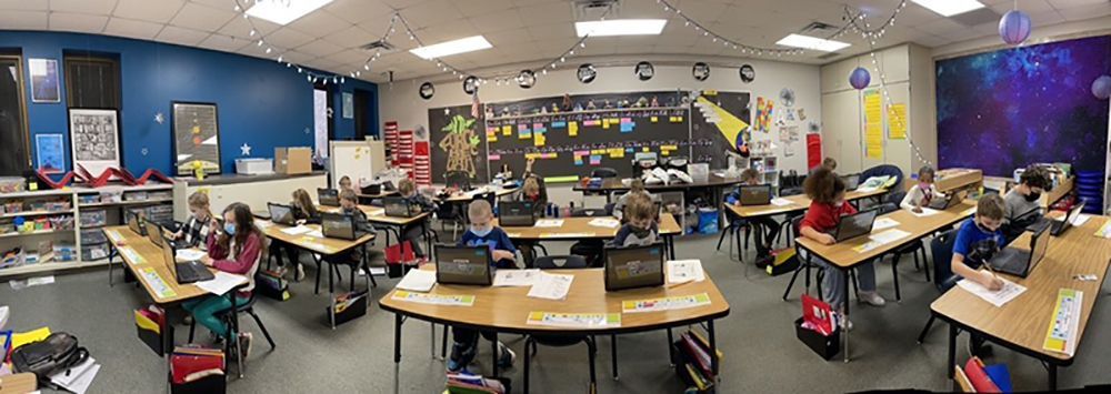 Students in Aaron Taylor's classroom at Carl Sandburg Elementary School in Charleston type a New Year's Day poem on Jan. 7. (Credit: Charleston CUSD 1)