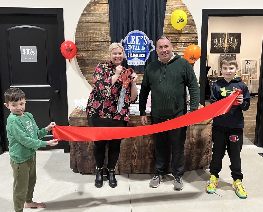 Andy and Maureen Lee, owners of Lee’s Rental, and sons Jack and Hunter were ready for their ribbon cutting and grand opening on January 14. (Son Gavin was unavailable for the picture.) – Photo submitted.