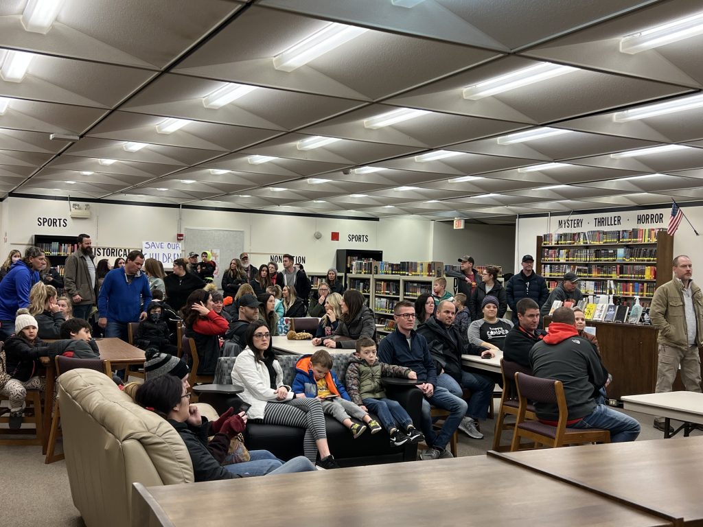 Manteno High School Library was standing room only for the special board meeting where the school board voted to make masks optional.