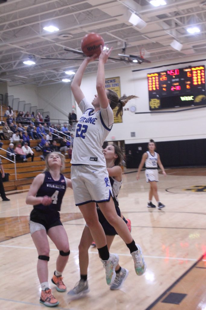Madi Schroeder scores against Wilmington on February 14th.