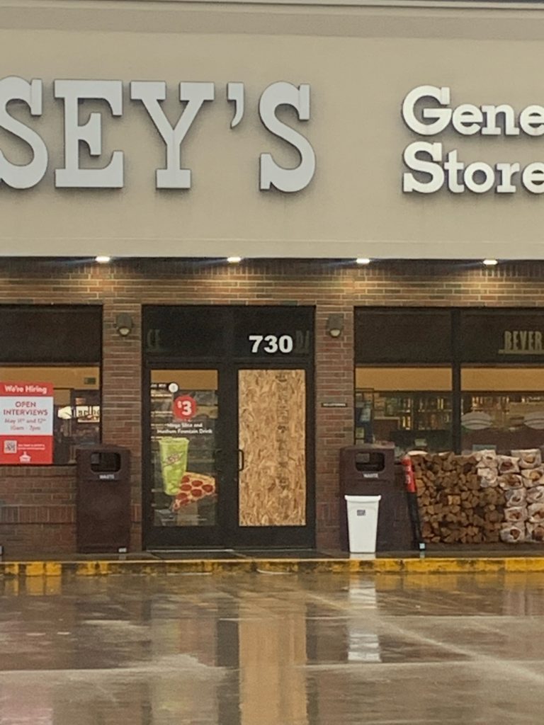 The glass door of the Beecher Casey’s was boarded by 8:56 am Tuesday morning. 