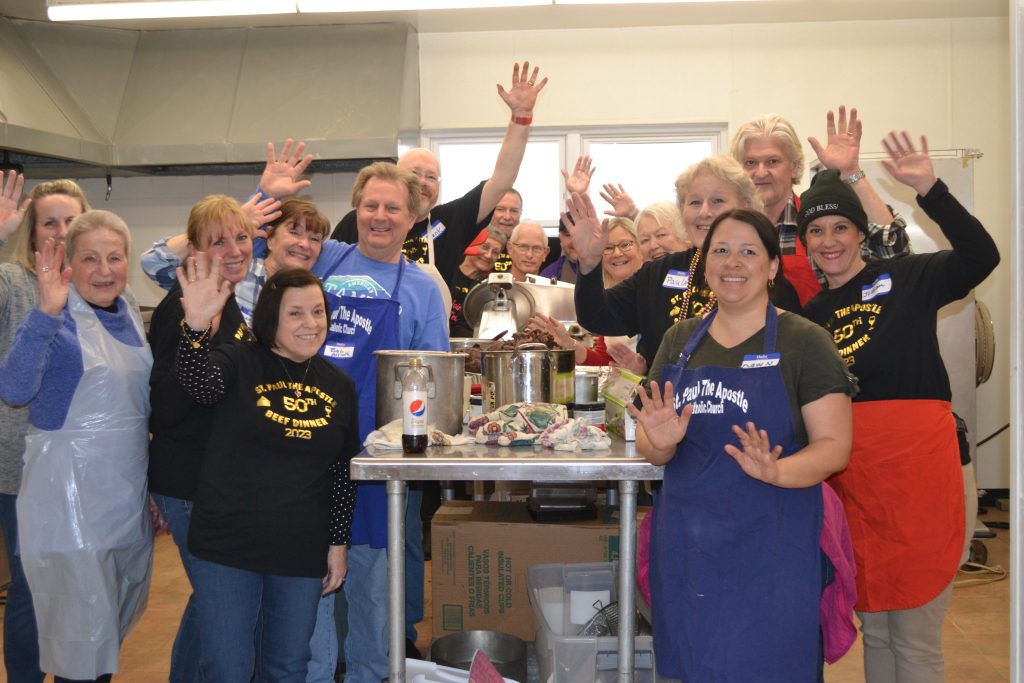 The happy kitchen crew was tired, but delighted to serve over 500 Mardi Gras Beef Dinners. Photo by Karen Haave.