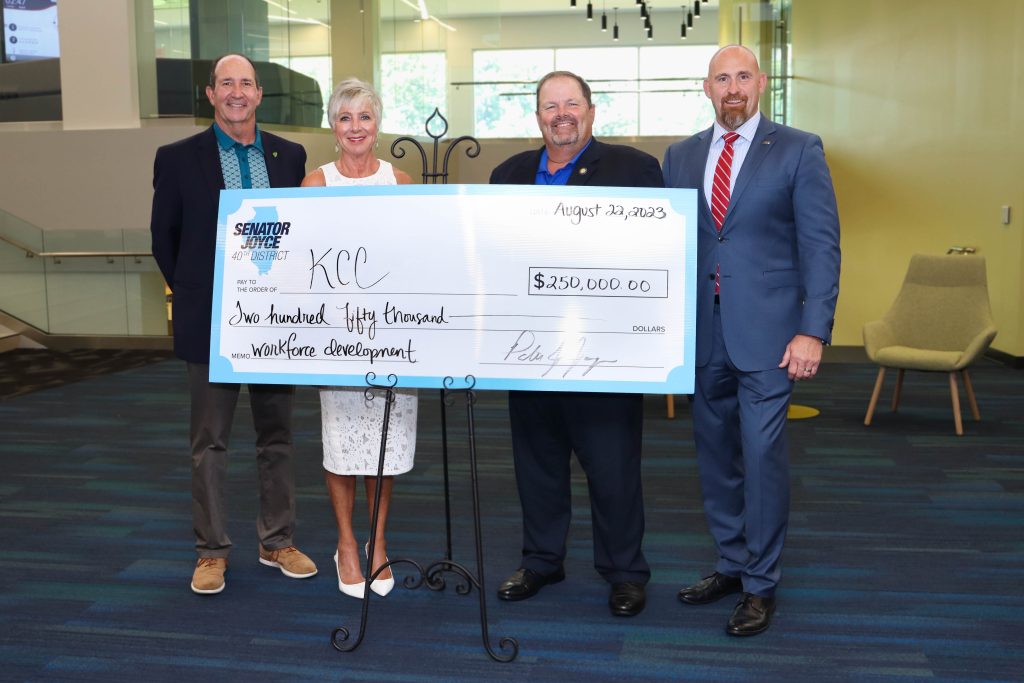Present for the check presentation are, left to right: Pat Martin, Cathy Boicken, Illinois Senator Patrick Joyce, and Dr. Michael Boyd. –Photo submitted.
