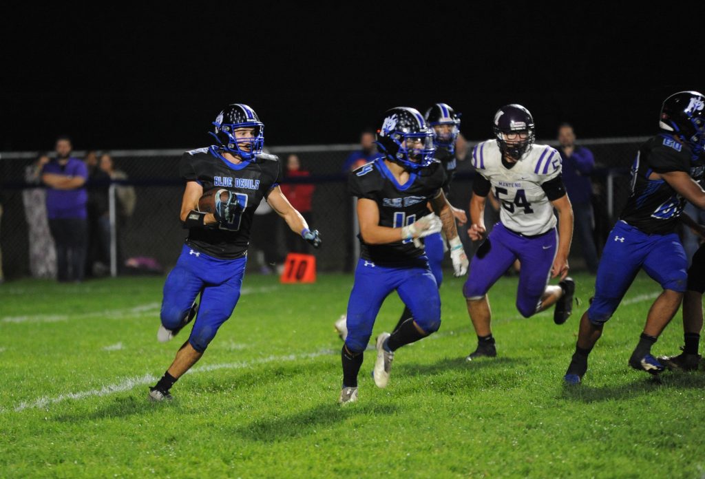 The Devils Rivera and Rodriguez had an excellent game helping to rout the Panthers, 47-15. –Photo by Bruce Samborski.