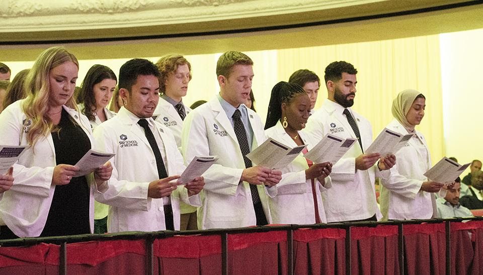 Students receive white coats at SIU ceremony. –Photo submitted.
