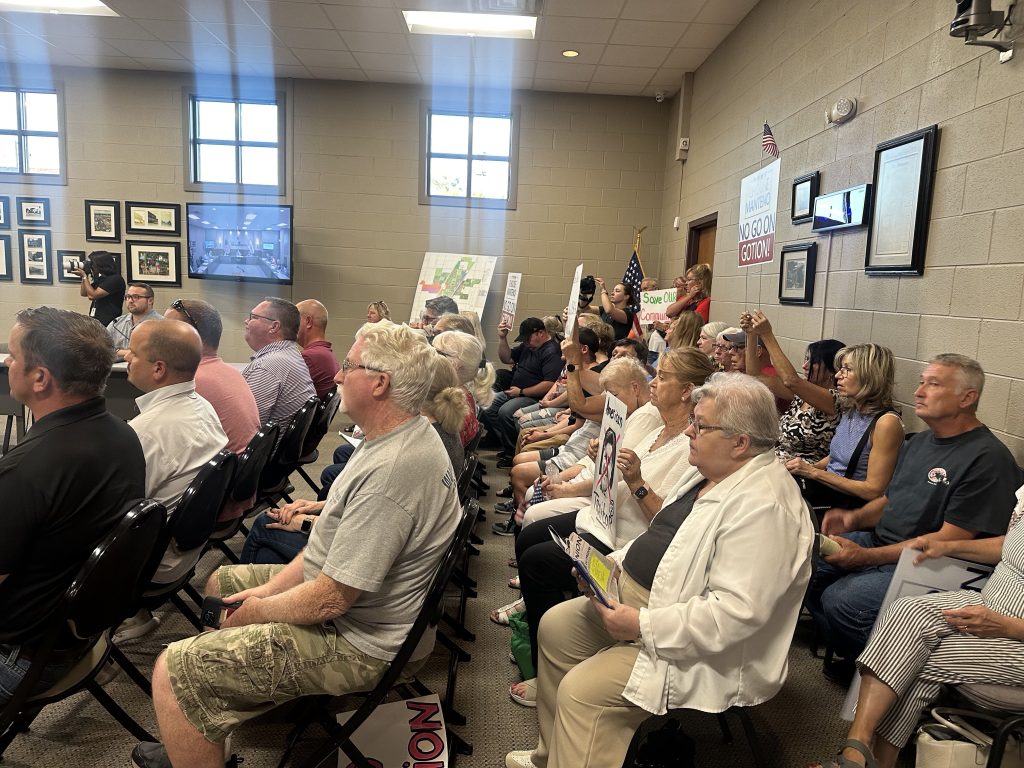 19 people spoke and even more packed the audience at the October 2nd Manteno Village Board meeting. Photo by Andrea Arens.