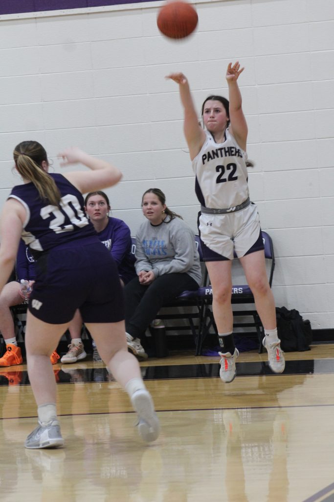 Lila Prindeville goes for three in the Panther victory over the Wildcats on February 12. –Photo by Jim Piacentini.