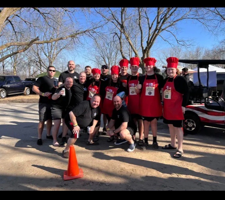 Crete PD posed before their run in the Manteno Lake. –Photo by Karen Haave.